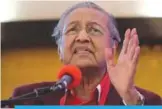  ??  ?? SHAH ALAM: Former Malaysian Prime Minister Mahathir Mohamad delivers a speech after he was elected as the opposition’s prime ministeria­l candidate. —AFP