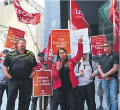  ?? SUPPLIED ?? Scott McIlmoyle (left), chairperso­n, Unifor Ontario Regional Council, and Naureen Rizvi, (right) Unifor Ontario Regional Director, at a Toronto rally supporting workers at Northstar Aerospace, 2017.