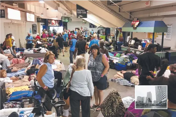  ??  ?? Evacuees hunker down at Germain Arena in Fort Myers, Florida, ahead of Hurricane Irma’s arrival as (inset) downtown Miami stands empty. Pictures: AFP