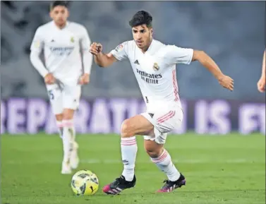  ??  ?? Marco Asensio, en una acción durante el duelo contra el Sevilla del pasado domingo.