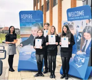  ??  ?? Well done The Food for All project team - made up of S2 pupils Ewan, Eilidh D, Eilidh J and Imogen mentored by teacher Nicole Beattie - claimed top prize at the national event