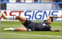  ??  ?? SLIDE RULE: Aleksandar Mitrovic grabs comical first