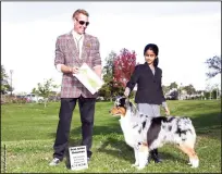  ?? COURTESY PHOTOGRAPH ?? A dog handler is presented an award for Best Junior Showman during the 2016 San Joaquin Kennel Club dog show in Stockton. After being held in Stockton for decades, the event will be held at the Lodi Grape Festival grounds this year.