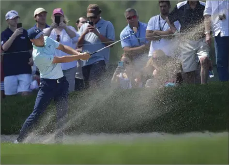  ?? AP PHOTO ?? Jordan Spieth hits his second shot on the ninth hole during the third round of the Travelers Championsh­ip golf tournament at TPC River Highlands on Saturday in Cromwell, Conn.