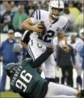  ?? MATT ROURKE – THE ASSOCIATED PRESS ?? Eagles defensive end Derek Barnett, here tackling Colts QB Andrew Luck, is reportedly through for the season with a shoulder injury that likely requires surgery.