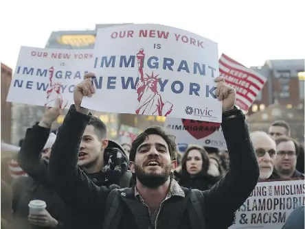  ?? SPENCER PLATT/GETTY IMAGES ?? Long after Noah Webster first coined the term, to mean “to remove into a country for the purposes of permanent residence,” immigratio­n would define the U.S. in the ensuing centuries.