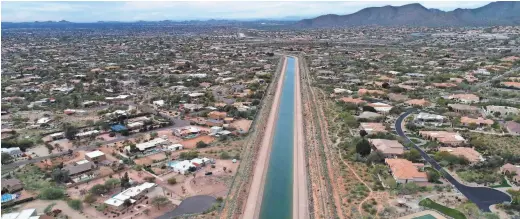  ??  ?? The CAP canal is shown in Scottsdale. Next near, Arizona will face its first mandatory cutbacks in Colorado River water.