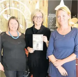  ?? Picture: JON HOUZET ?? TELLING THE STORY: Author Tracy Going, centre, with The Bean and Olive owner Jo Wilmot, left, and Carey Webster, at Going’s book launch at the restaurant on Saturday
