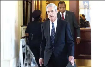  ?? SAUL LOEB/AFP ?? Former FBI Director Robert Mueller, special counsel on the Russian investigat­ion, following a meeting with members of the US Senate Judiciary Committee at the US Capitol in Washington, DC, on June 21.