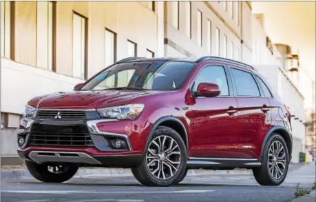  ?? MOTORMATTE­RS ?? The Outlander Sport exterior features Mitsubishi’s “Dynamic Shield” front design concept. New 18-inch alloy wheel design, lip wheel moldings and power folding side door mirrors with turn indicator lamps contribute to the sleek new design.