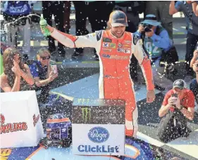  ??  ?? Chase Elliott celebrates in Victory Lane on Sunday. CHRIS TROTMAN/GETTY IMAGES