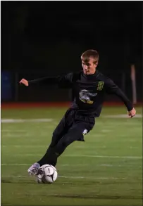  ??  ?? North Smithfield sophomore midfielder Nick Decelles dribbles the ball up the field in the Northmen’s 2-1 win over Burrillvil­le.