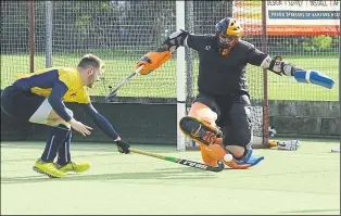  ?? Picture: Paul Amos FM20203562 ?? Ashford’s keeper blocks this shot against Old Wills