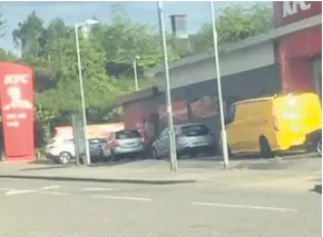  ??  ?? Drive-thru queue Motorists line up outside Wishaw’s KFC for their fried chicken