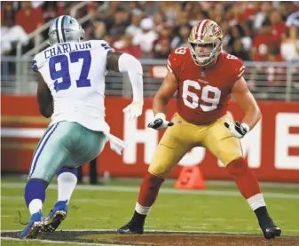  ?? Tony Avelar / Associated Press ?? Tackle Mike McGlinchey gets set to block Dallas defensive end Taco Charlton during the first half of the 49ers’ NFL preseason opener at Levi’s Stadium on Thursday.