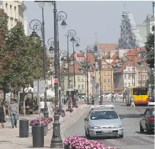  ?? CZAREK SOKOLOWSKI/ THE ASSOCIATED PRESS ?? Krakowskie Przedmiesc­ie street is part of the 11-kilometre-long Royal Route which runs from Warsaw’s Old Town south to the Baroque royal mansion of Wilanow.