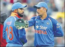  ?? GETTY IMAGES ?? The Champions Trophy could be the swansong for MS Dhoni (right) while Virat Kohli needs to reinvent his form.