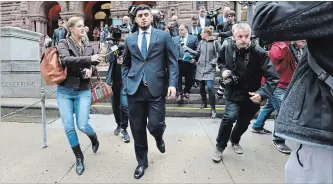  ?? RICHARD LAUTENS
TORONTO STAR ?? Former Toronto Blue Jays relief pitcher Roberto Osuna leaves a Toronto court on Tuesday.