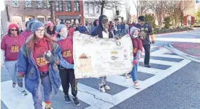  ?? ?? A “Walk as One” event was held in downtown Spartanbur­g on Jan. 14, 2023. The event as part of the Dr. Martin Luther King Jr. Unity Celebratio­n Week in Spartanbur­g.