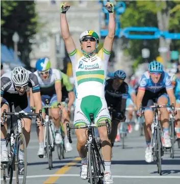  ?? PHOTO D’ARCHIVES, DANIEL MALLARD ?? Simon Gerrans (les bras levés) au moment d’un de ses deux gains au Québec lors de la même fin de semaine, en septembre 2014.