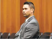  ?? NHATV. MEYER/STAFF ?? San Jose police Officer Derrick Antonio waits to be arraigned in Santa Clara County Superior Court. He is charged with unauthoriz­ed computer access.