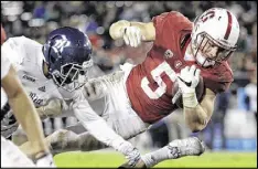  ?? MARCIO JOSE SANCHEZ / AP ?? It’s smart, not selfish, for players such as Stanford’s Christian McCaffrey to skip lower-echelon bowls to protect their potential NFL careers.