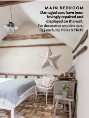  ??  ?? MAIN BEDROOM Damaged oars have been lovingly repaired and displayed on the wall. For decorative wooden oars, £95 each, try Hicks & Hicks