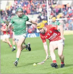  ?? (Pic: George Hatchell) ?? Cork’s Niall O’Leary gets to the ball ahead of Limerick’s Will O’Donoghue in the Munster SH Championsh­ip at Páirc Ui Chaoimh.