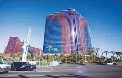  ??  ?? LAS VEGAS: NHP and Metro Police officers block off the entrance off Flamingo Road to the Rio Hotel & Casino after reports of smoke coming from the 21st floor of the Masquerade Tower led to guests being evacuated. — AP