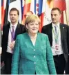  ??  ?? Plea for compromise . . . German Chancellor Angela Merkel leaves the European Union leaders summit in Brussels yesterday.