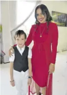  ??  ?? Will In Charge owner Lorna Bagwandeen and son Matthew were extremely proud of the horse’s winning performanc­e at diamond Mile 2018.