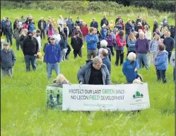  ??  ?? ■ Nanpantan residents stage a protest against plans for a developmen­t they claim will take away the last remaining open space in the area.