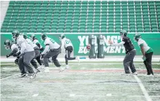  ?? BRANDON HARDER ?? Saskatchew­an Roughrider­s quarterbac­k Zach Collaros takes a snap at practice on Wednesday at Mosaic Stadium.