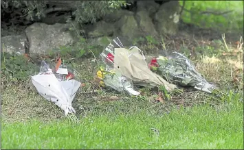  ??  ?? Tributes have been left at the scene of the crash in Mundy Bois Road, Egerton that killed 17-year-old Millie