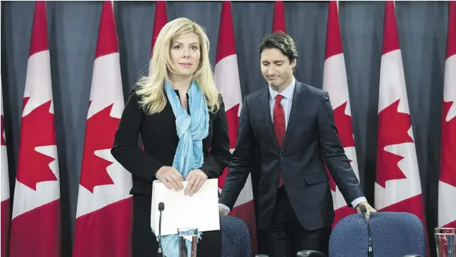  ?? Justin Tang / The Cana dian Press ?? Liberal leader Justin Trudeau with former Conservati­ve MP Eve Adams at a news conference Monday where she announced she is joining the Liberals.