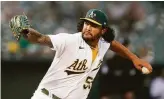  ?? Jeff Chiu / Associated Press ?? A’s starter Sean Manaea allowed all four Seattle runs in five innings. “Maybe not his best stuff,” manager Bob Melvin said.