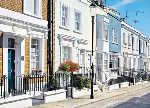  ??  ?? A row of houses in Notting Hill. High property prices mean many families in London and the South East will be caught out