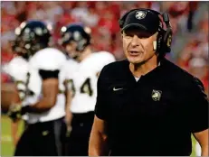 ??  ?? Army head coach Jeff Monken shouts in the first half against Oklahoma on Saturday in Norman, Okla.