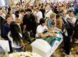  ?? FOTO ?? La eucaristía por los tres jóvenes asesinados tuvo lugar en la Basílica Metropolit­ana de Medellín.