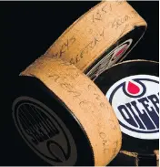  ?? POSTMEDIA NEWS ?? A puck labelled “This one is the real one” is pictured along with two other pucks from the night that Wayne Gretzky scored his record-setting 1,851st NHL point.