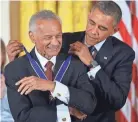  ?? MANDEL NGAN/AFP VIA GETTY IMAGES ?? President Barack Obama honors the Rev. C.T. Vivian with the Presidenti­al Medal of Freedom in 2013.