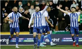  ?? ?? Matty Kennedy enjoys his moment after scoring Kilmarnock’s winner against Celtic. Photograph: Jeff Holmes/Shuttersto­ck