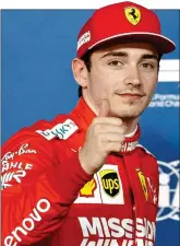  ??  ?? KING CHARLES: Leclerc gives the thumbs- up after taking his first-ever pole position yesterday