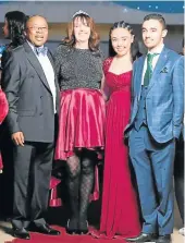  ?? Picture: IINKUMBUZO PHOTOGRAPH­Y ?? JACK FAMILY: Khusta Jack, left, celebrates his 60th birthday party surrounded by his family: wife Karen, daughter Cayla-Rose and son Themba, at Nangoza Jebe Hall last weekend