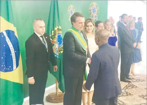  ??  ?? Minister of Foreign Affairs Carl Greenidge (right) meeting with new Brazilian Pressident, Jair Bolsonaro