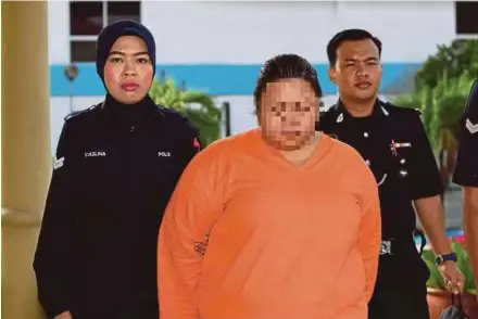  ?? BERNAMA PIC ?? The 33-year-old babysitter at the magistrate’s court in Selayang yesterday.
