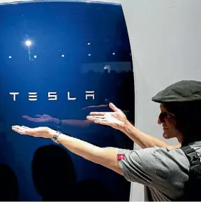  ?? PATRICK FALLON/REUTERS ?? Tesla could become the company that sells you your electricit­y as well as you car.