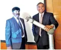  ??  ?? Sugath Jayatileke - MD Techfield (left) with Pradeep David - General Manager Universal Robots India and Sri Lanka.