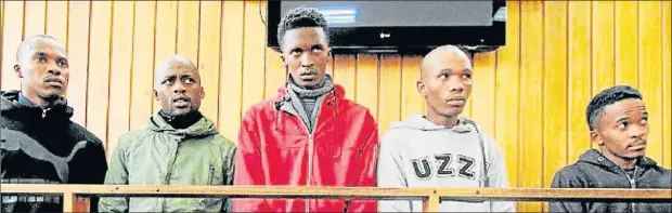  ?? Picture: LULAMILE FENI ?? AWAITING BAIL: The five WSU students accused of killing Lwando Mantshonts­ho in the dock at the Mthatha Magistrate’s Court yesterday