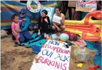  ?? PICTURE: EPA ?? A woman wearing a burkini participat­es in a ‘Wear what you want beach party’ protest outside the French embassy in London on Thursday. The protest was to show solidarity with French Muslim women and to call for the repeal of a law by the French...